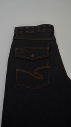 Dark denim apron with a pocket on a light gray background
